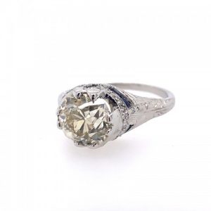 ESTATE ART DECO REVIVAL PLATINUM DIAMOND AND SAPPHIRE ENGAGEMENT RING