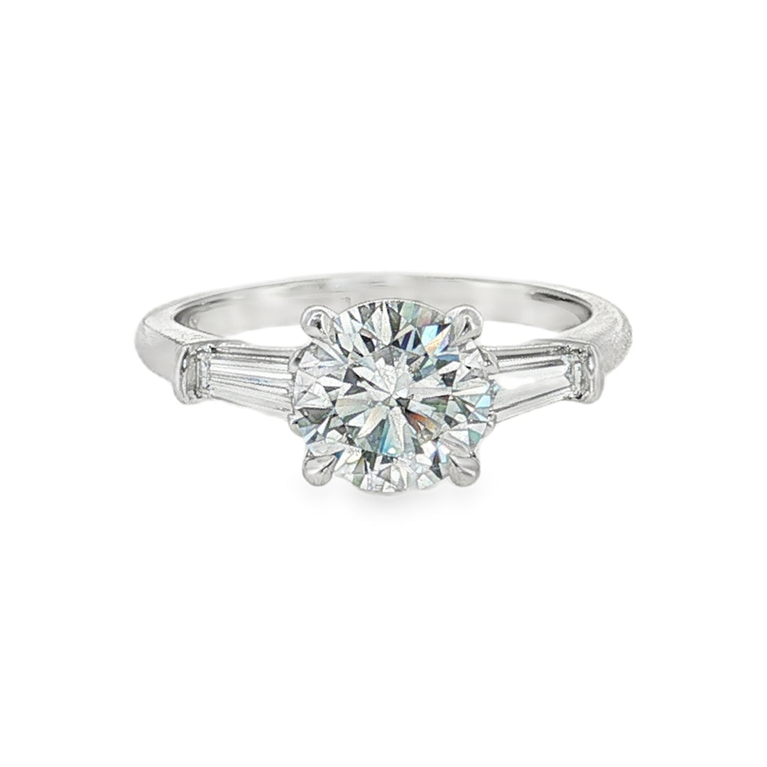 Platinum round and baguette diamonds engagement ring