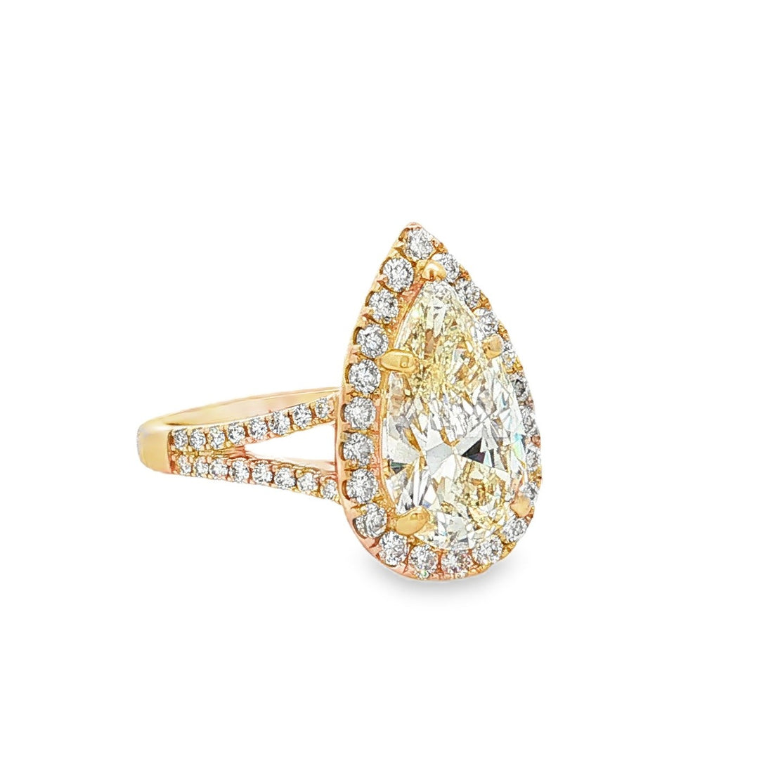 Estate 14kt yellow gold pear-shaped diamond halo engagement ring