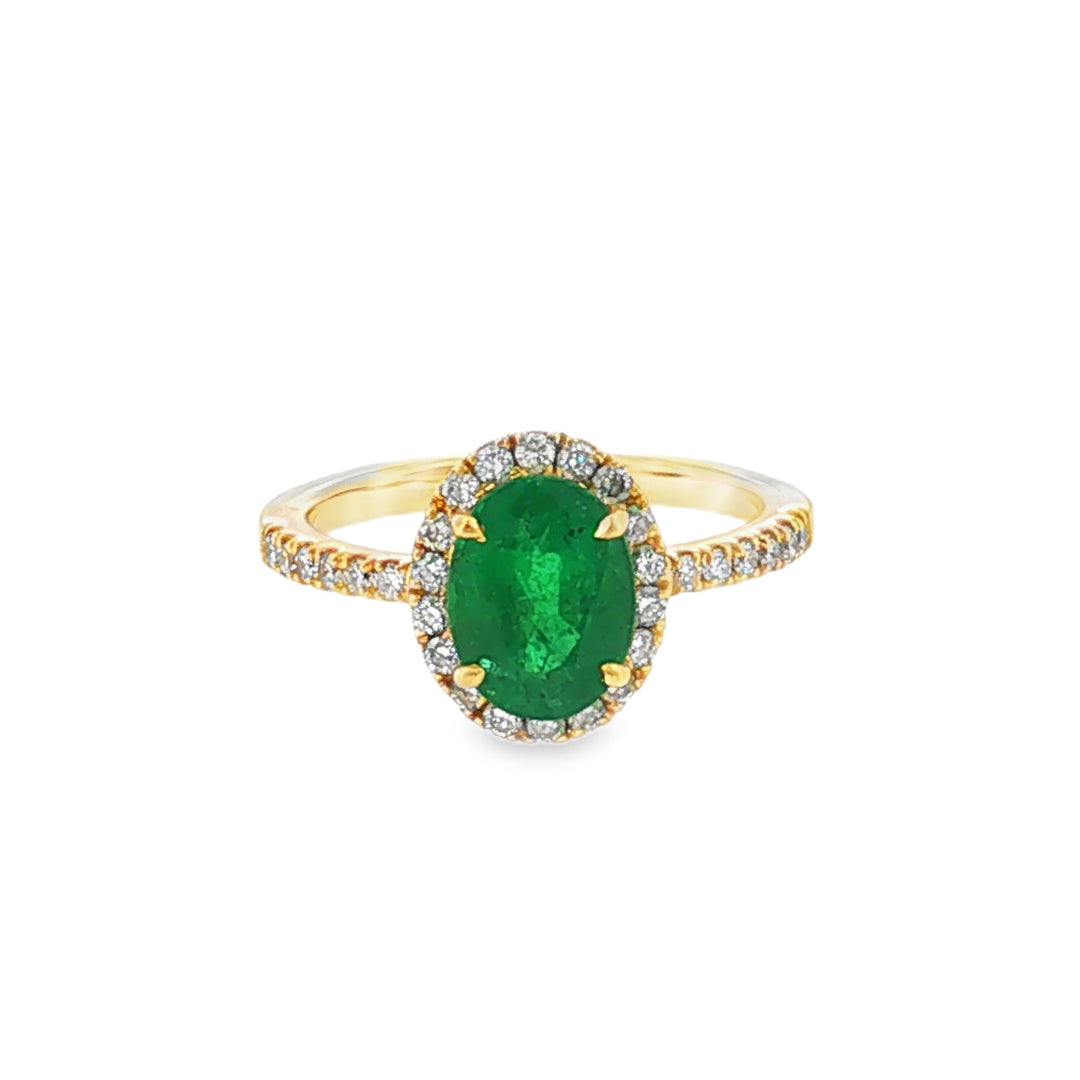 Estate 14kt yellow gold emerald and diamond halo ring
