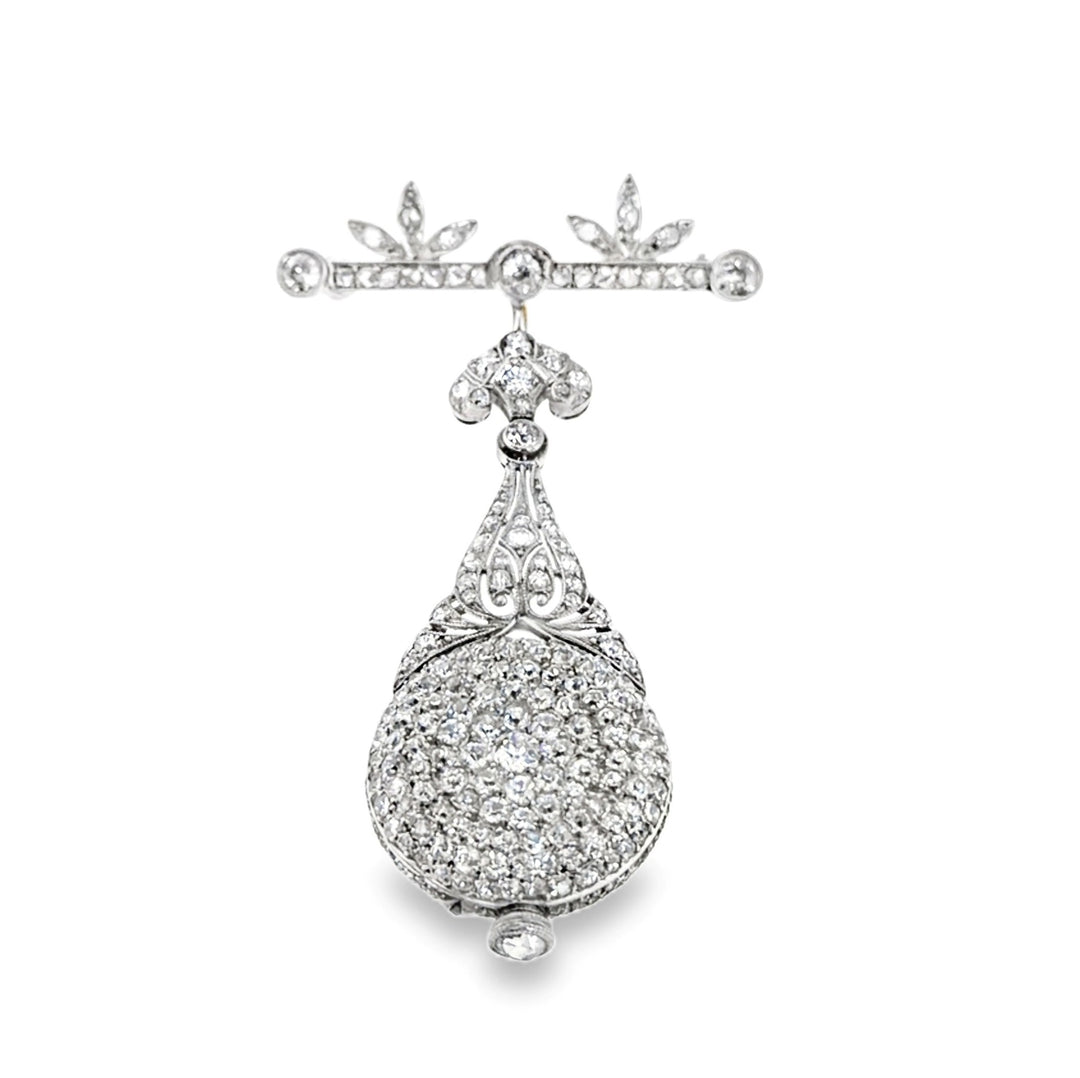 Estate Edwardian platinum and diamond pendant watch suspended from a diamond-set pin