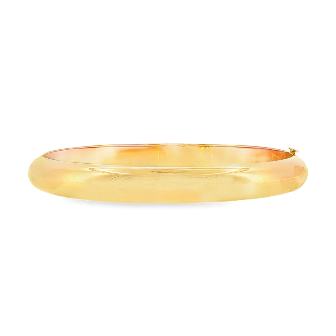 14kt yellow gold 8mm domed bangle bracelet