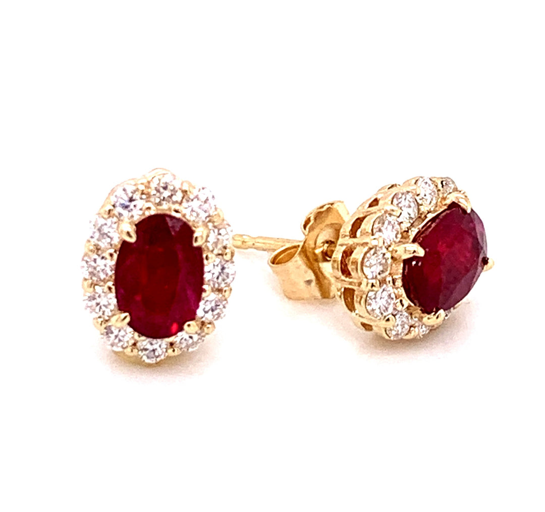14kt yellow gold oval ruby and diamond halo stud earrings