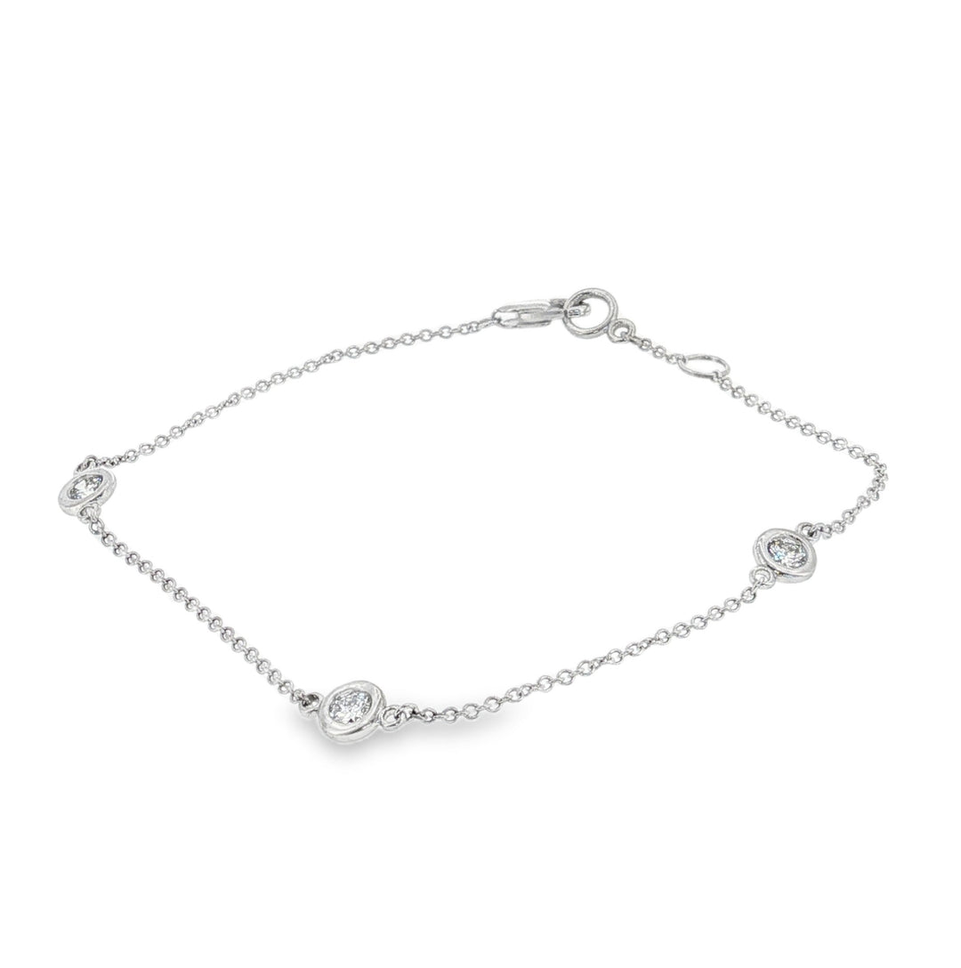 14kt whte gold three-diamond bezel station bracelet