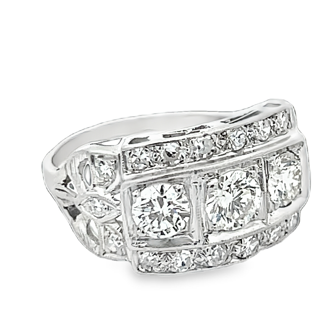 Estate Mid-Century platinum three stone diamond ring