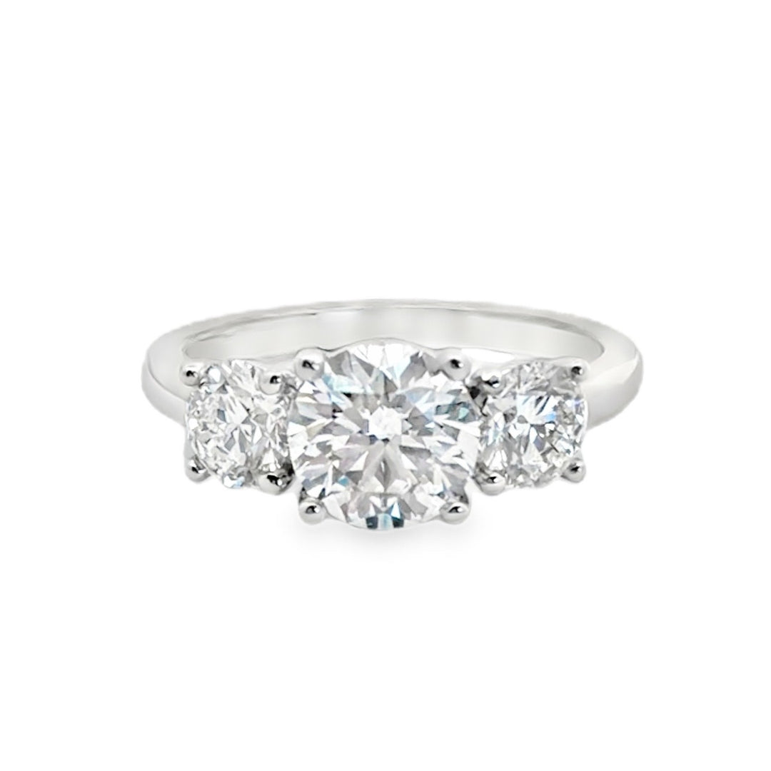 Platinum three-stone round diamonds engagement ring