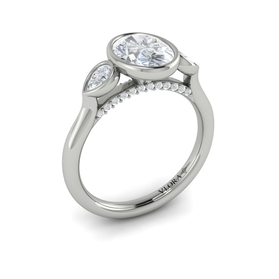 Vlora platinum oval and pear-shaped diamonds three-stone engagement ring mounting