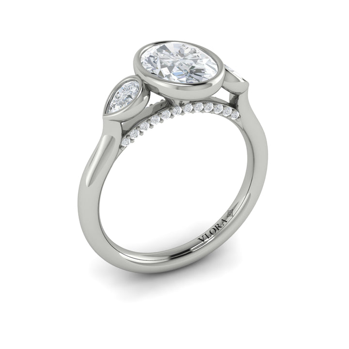 Vlora platinum oval and pear-shaped diamonds three-stone engagement ring mounting