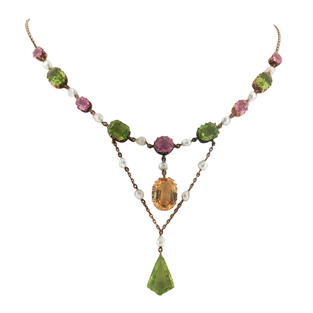Estate Edwardian 15kt yellow gold Suffragette necklace featuring peridot, pink tourmaline, precious topaz and freshwater pearls