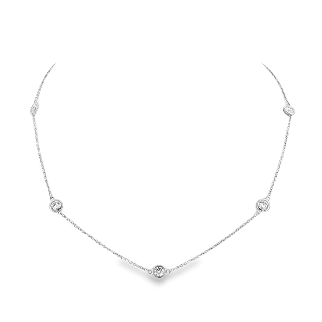 Platinum seven-diamond bezel station necklace