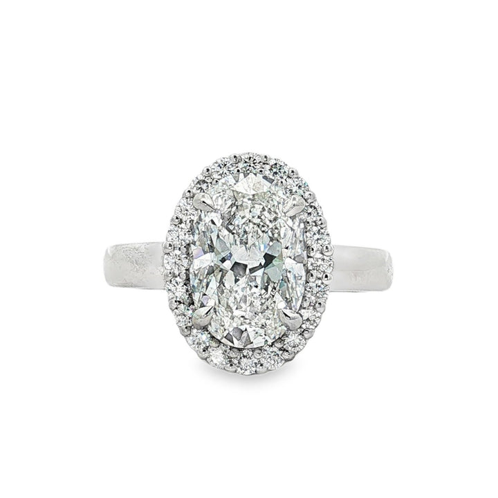 Peter Storm platinum oval diamond halo engagement ring