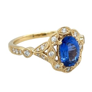 18kt Yellow Gold Sapphire And Diamond Stylized Halo Ring