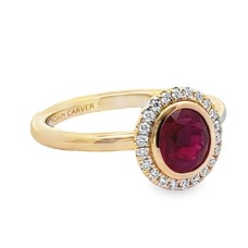 14kt Yellow Gold Oval Ruby And Diamonds Halo Ring