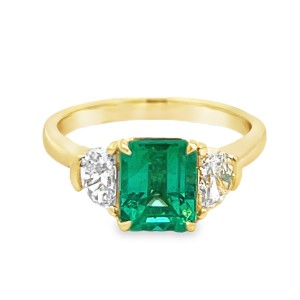 18kt Yellow Gold Emerald Cut Emerald And Half Moon Diamond Three Stone Ring