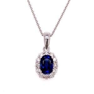 14kt White Gold Oval Sapphire And Diamond Halo Pendant Necklace